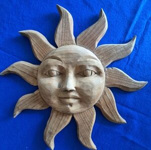 Artisinal Hand carved wooden Sun.